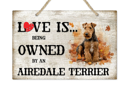 Love is being owned by an Airedale Terrier Dog Breed Themed Sign