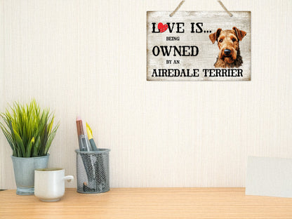 Love is being owned by an Airedale Terrier Dog Breed Themed Sign
