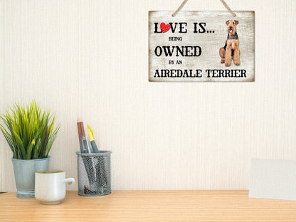 Love is being owned by an Airedale Terrier Dog Breed Themed Sign